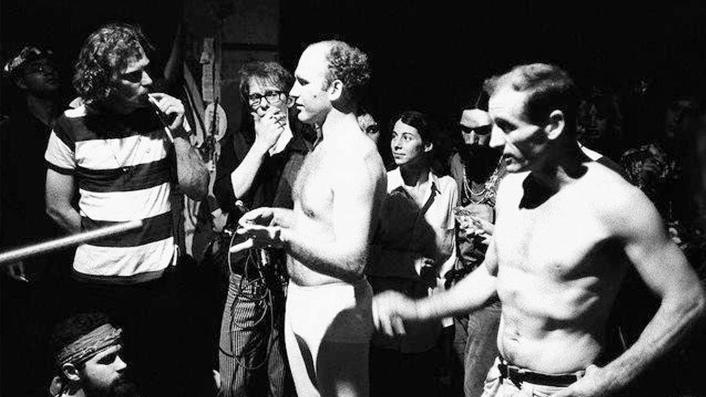 Kesey and Cassady, Barechested, 1968.